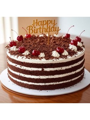 Black Forest cake in round shape with happy birthday topper- Ahmedabad Delivery